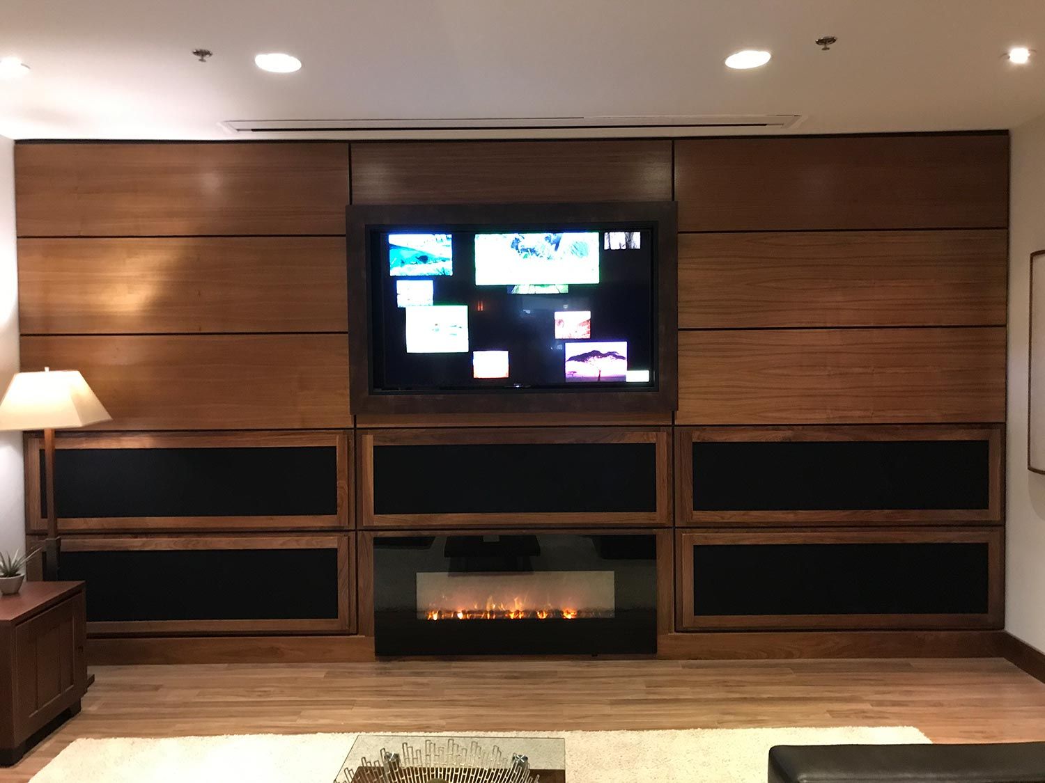 Media Room with dark wood furniture and fireplace