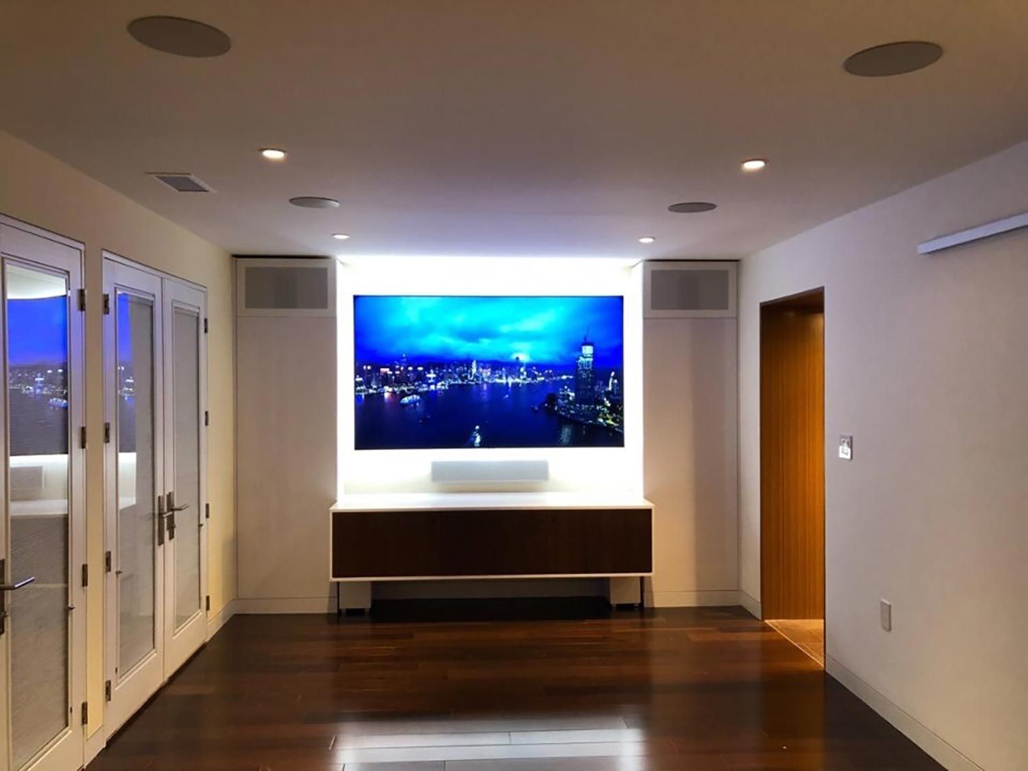 Media Room with in-ceiling speakers and LED lighting