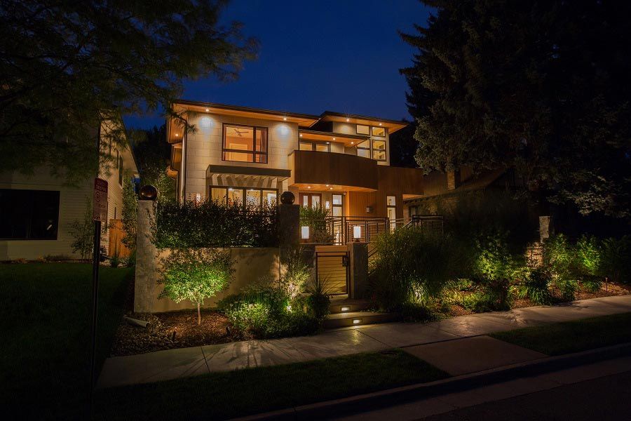 House with outdoor lighting at night